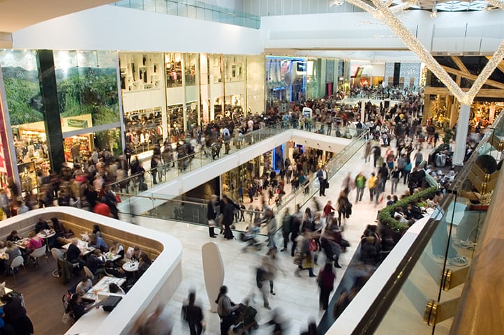 a crowd at a shopping mall