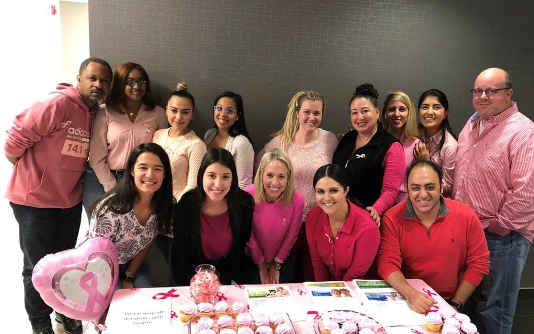 Planned employees at a breast cancer awareness event